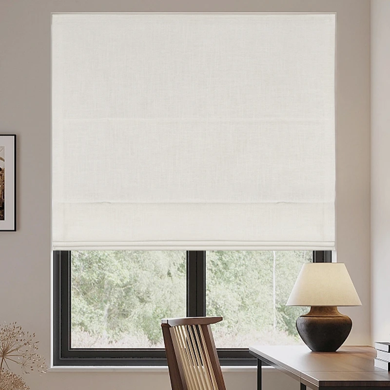 Roman shades next to the desk and chair